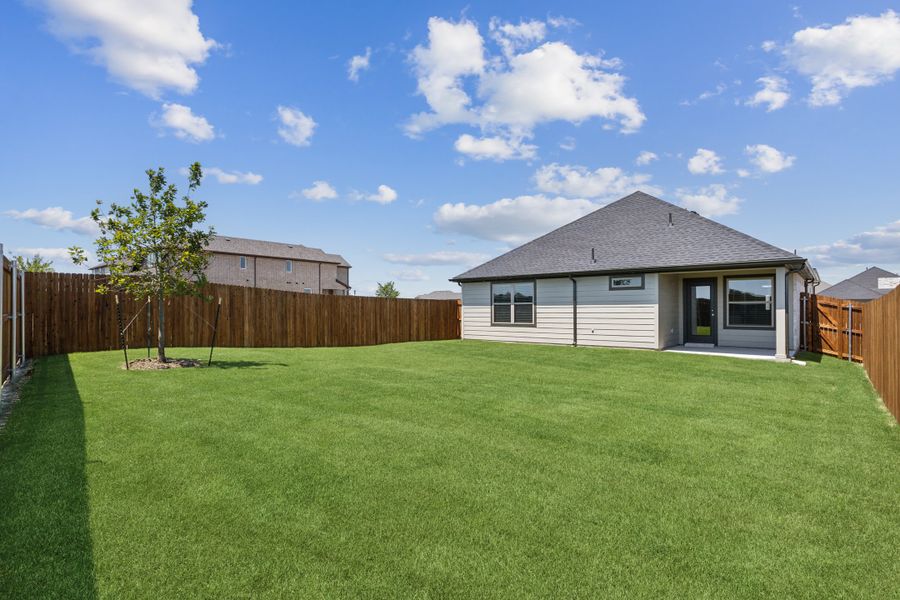 Covered Patio in the Amber home plan by Trophy Signature Homes – REPRESENTATIVE PHOTO