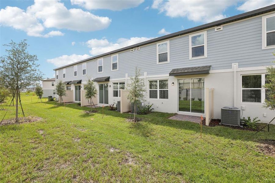Exterior details and patio area of a home in Cagan Crossings West, Clermont (Image 24).
