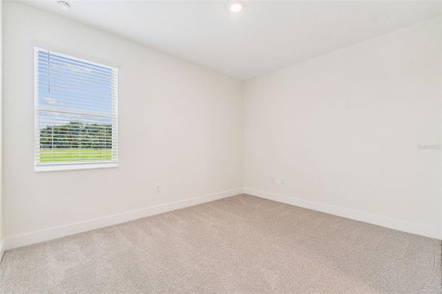 Spacious, unfurnished interior of a new home in Hidden Ridge, New Port Richey (Image 61).