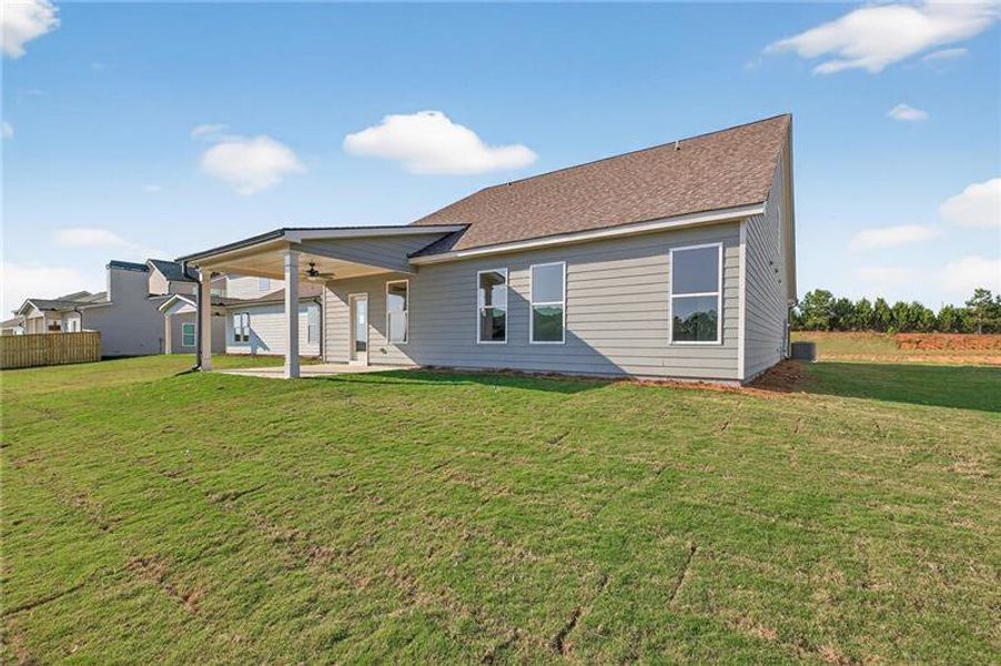 Exterior details and patio area of a home in Sutton's Landing, Statham (Image 19).