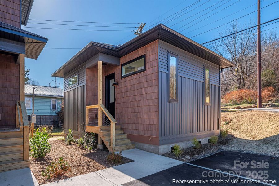 Exterior details and patio area of a home in , Waynesville (Image 5).