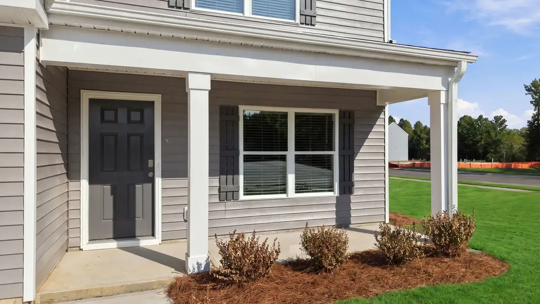 Exterior details and patio area of a home in Bynum Farms, Farmville (Image 3).