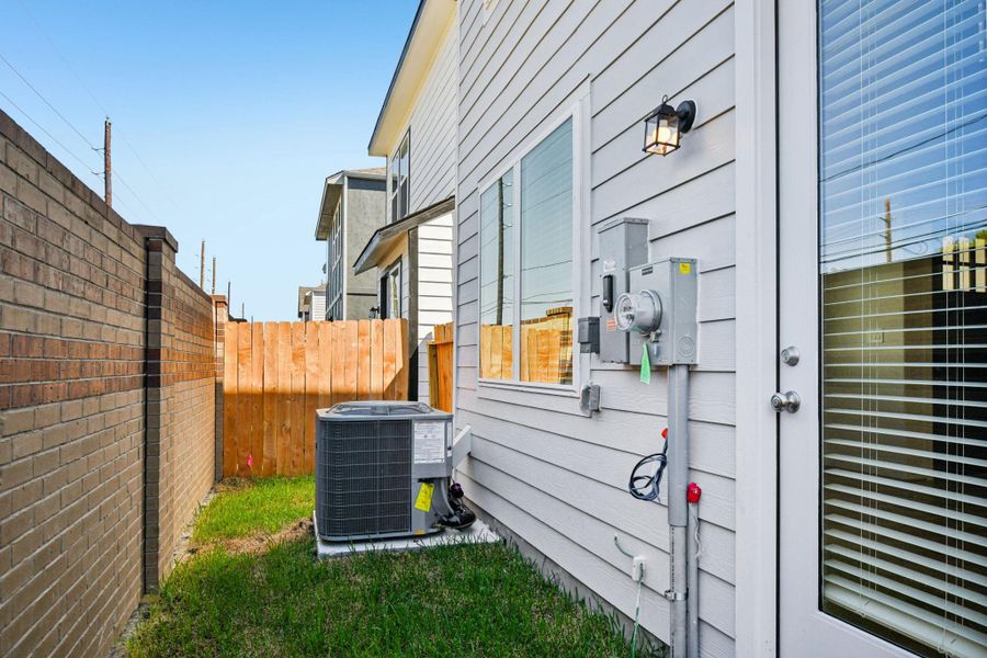 Exterior details and patio area of a home in Spring Brook Village - City Series, Houston (Image 3). Exterior details and patio area of a home in Spring Brook Village - City Series, Houston (Image 3).