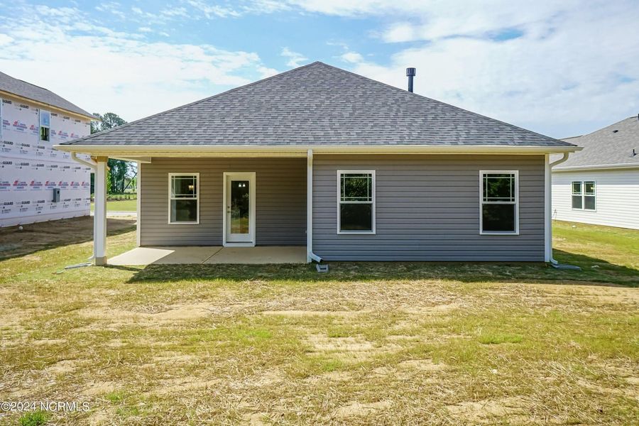Front exterior of a new home in Waverly Place, Richlands, NC, highlighting curb appeal (Image 17).