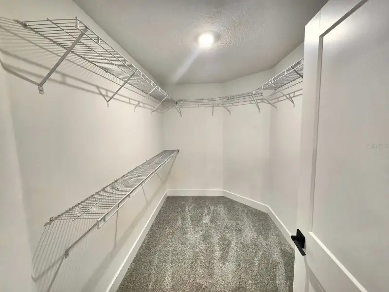 Spacious, unfurnished interior of a new home in Harmony Central, Harmony (Image 12).