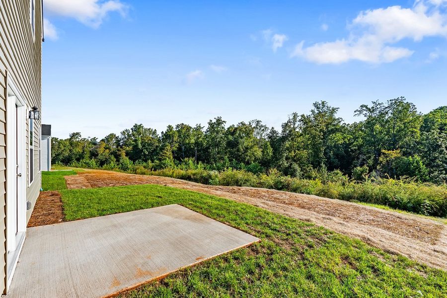 Front exterior of a new home in Bell West, Kernersville, NC, highlighting curb appeal (Image 24).