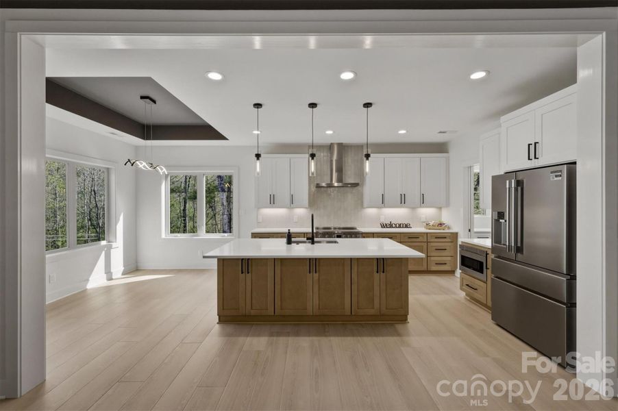 The dining room is located conveniently just outside the kitchen with stunning views. Do not miss the decorative ceiling in the dining room. The dining room is located conveniently just outside the kitchen with stunning views. Do not miss the decorative ceiling in the dining room.