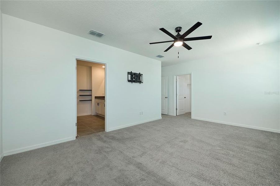 Spacious, unfurnished interior of a new home in Westgate at Avalon Park, Wesley Chapel (Image 52).