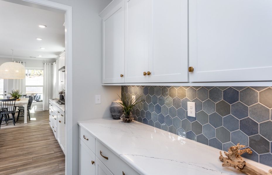 Representative furnished interior of a home built from the Continental by Pulte Homes in Riverlights, Wilmington (Image 4).