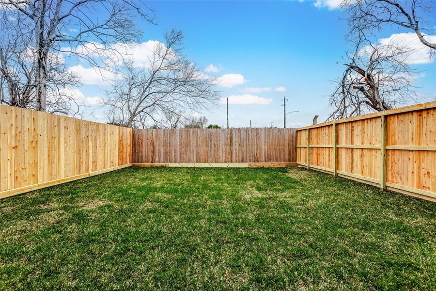 Exterior details and patio area of a home in , Houston (Image 3).