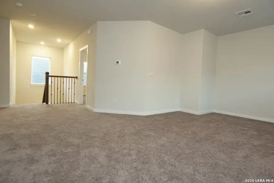Spacious, unfurnished interior of a new home in Ladera - High Point 45', San Antonio (Image 23). Spacious, unfurnished interior of a new home in Ladera - High Point 45', San Antonio (Image 23).
