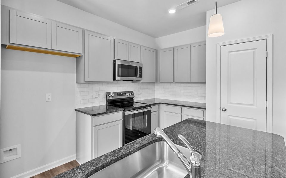 Furnished interior view inside a new home in Bell West, Kernersville (Image 12).