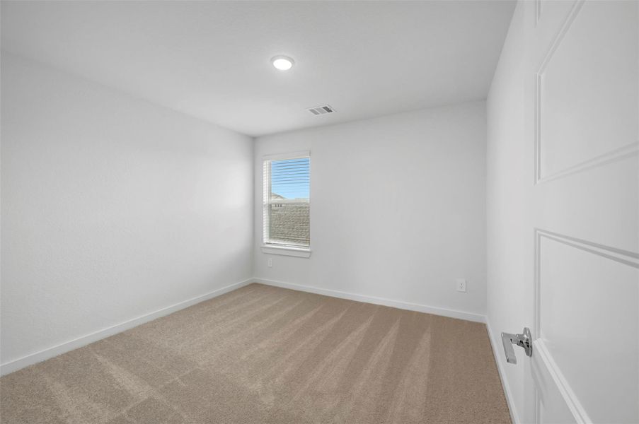 Spacious, unfurnished interior of a new home in Wildrye, Waller (Image 32).