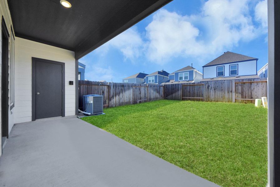Exterior details and patio area of a home in , Houston (Image 3).