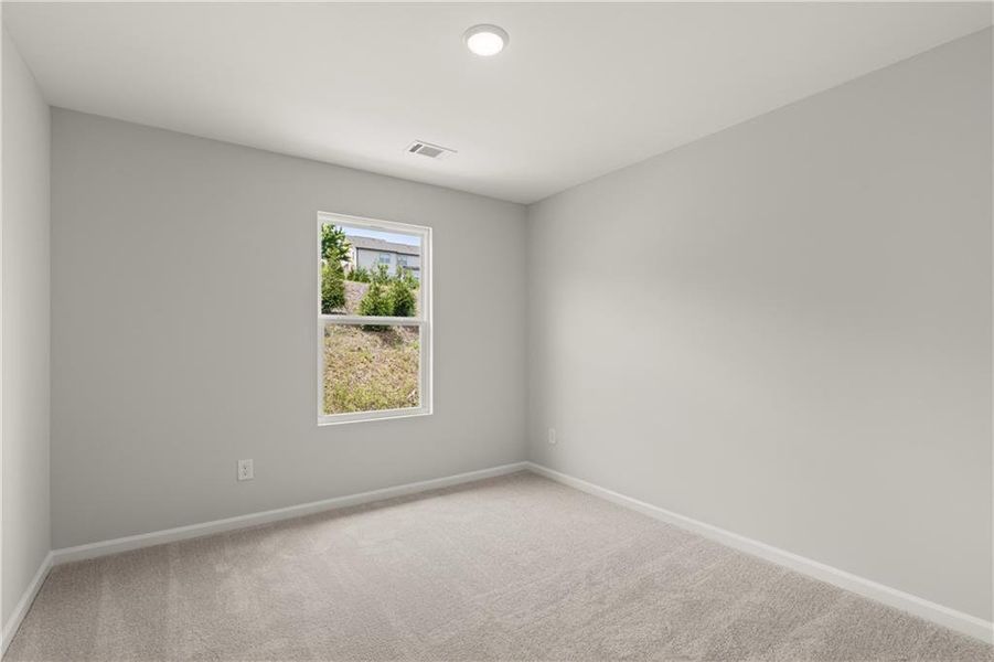 Spacious, unfurnished interior of a new home in The Bluffs, Canton (Image 20).