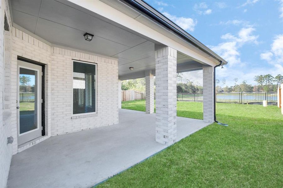 Experience outdoor living at its finest on this expansive covered patio,thoughtfully designed for BBQs and delightful outdoor dining.