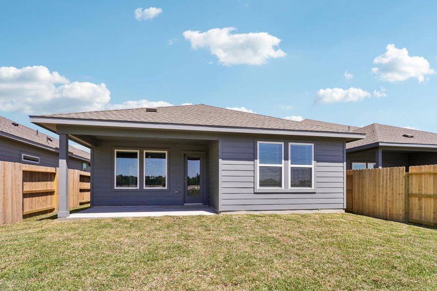 Exterior details and patio area of a home in , Conroe (Image 21). Exterior details and patio area of a home in , Conroe (Image 21).