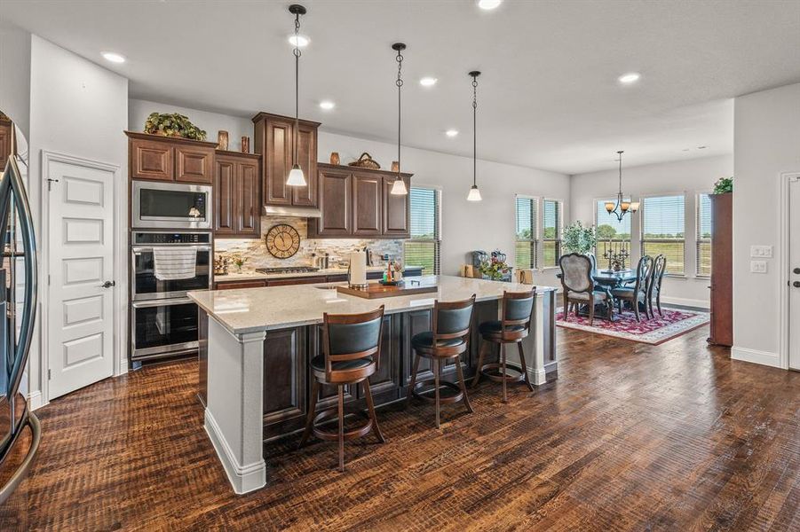 Upgraded Appliances, Gas Cook Top, Hand Scraped Hard Wood Floors.