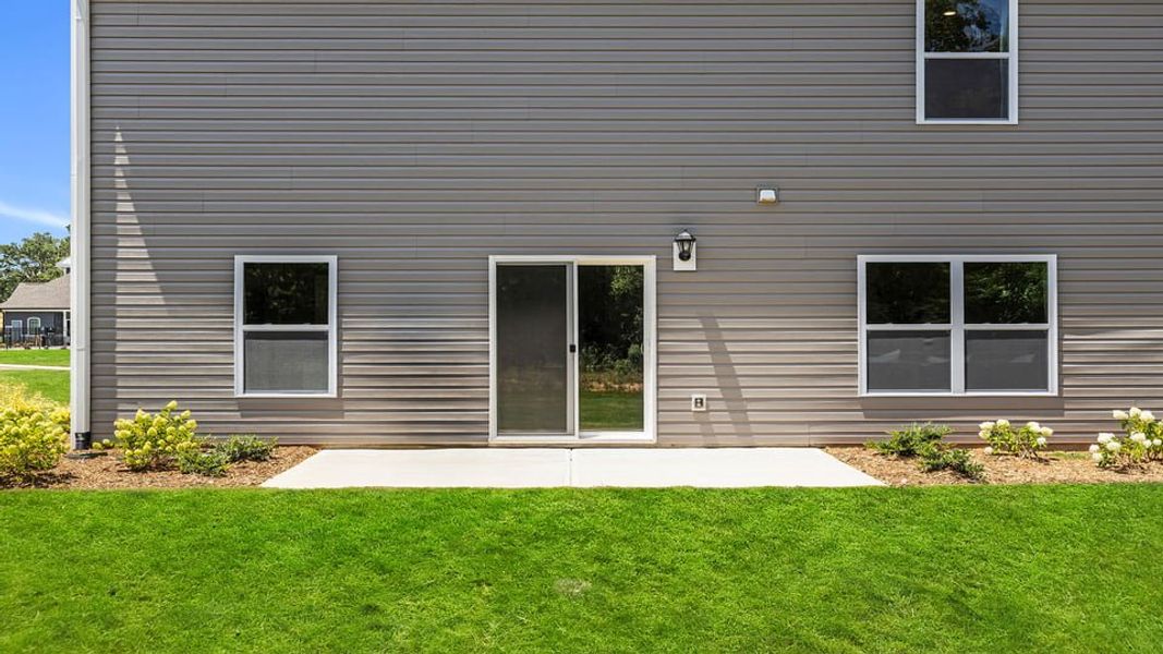 Exterior details and patio area of a home in Lakestone, Woodruff (Image 26).
