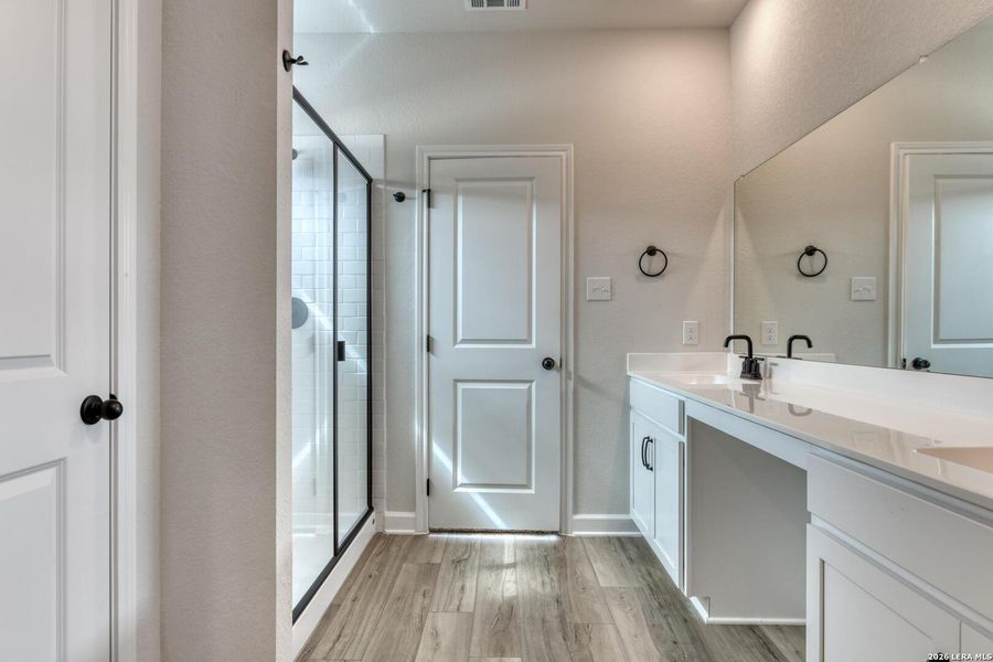 Furnished interior view inside a new home in Hennersby Hollow, San Antonio (Image 8).