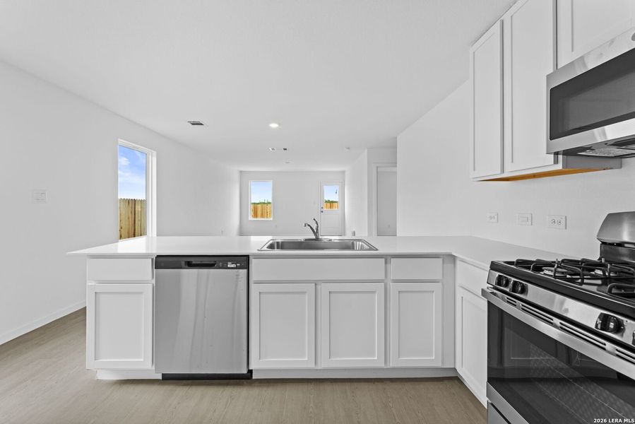 Furnished interior view inside a new home in Spring Grove, St. Hedwig (Image 4).