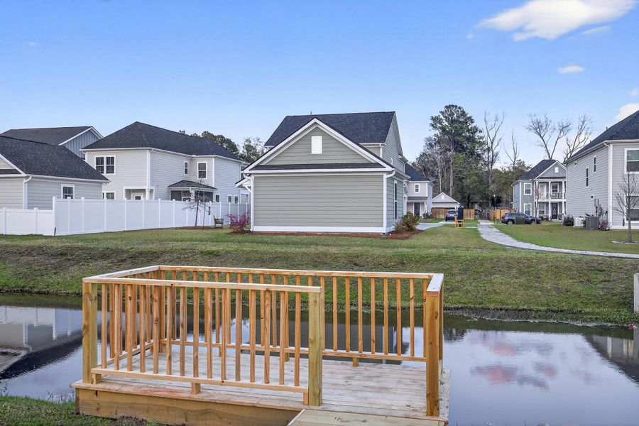 Exterior details and patio area of a home in Pineland Village, Summerville (Image 3).