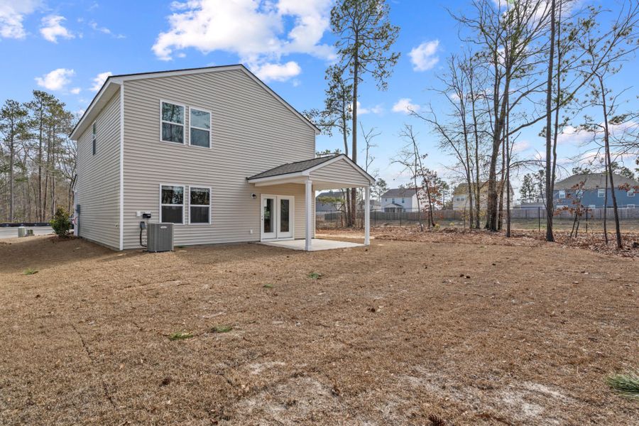 Exterior details and patio area of a home in Grand Arbor, Blythewood (Image 3).