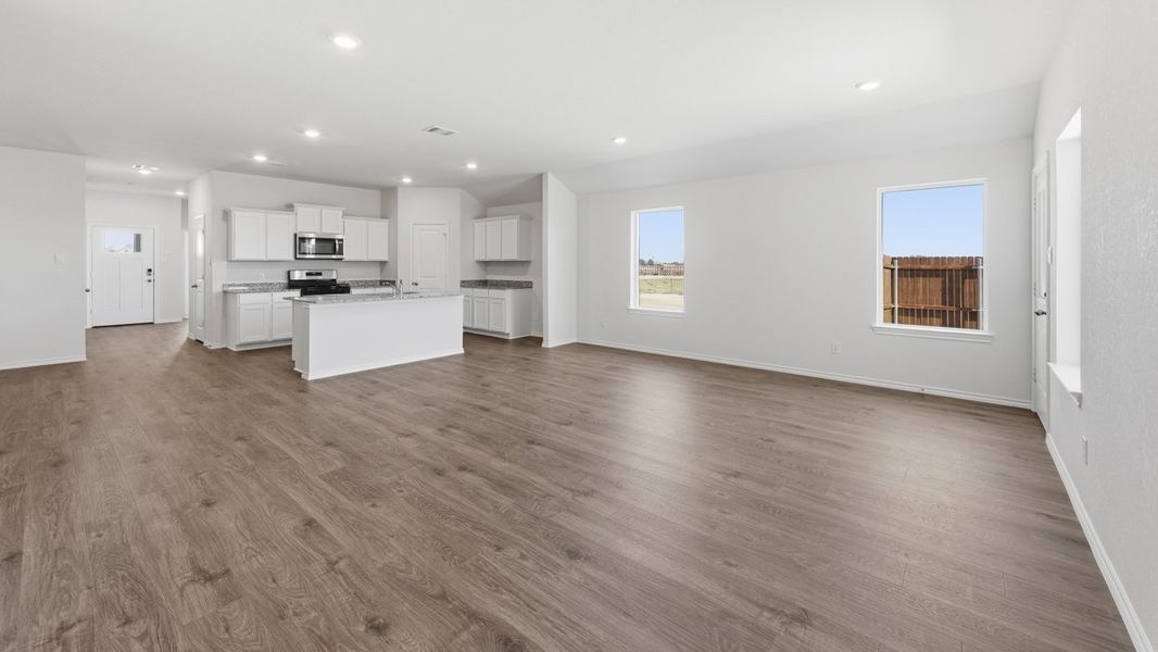 Representative unfurnished interior of a home built from the Learjet by D.R. Horton in Windrose, Pilot Point (Image 9).