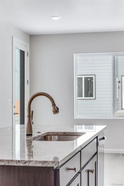 Furnished interior view inside a new home in Medley at Reunion Ridge, Commerce City (Image 14).
