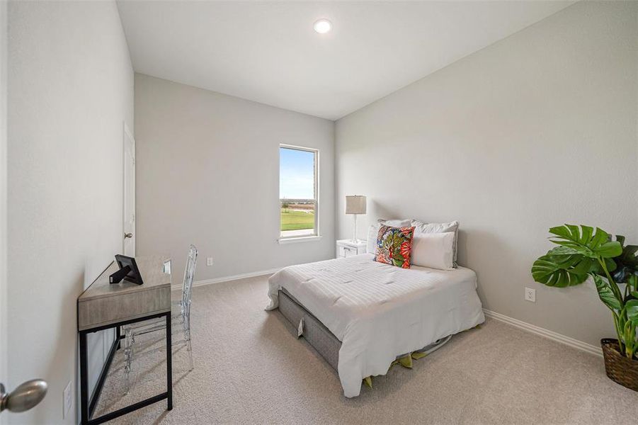 Bedroom with carpet flooring and recessed lighting Bedroom with carpet flooring and recessed lighting