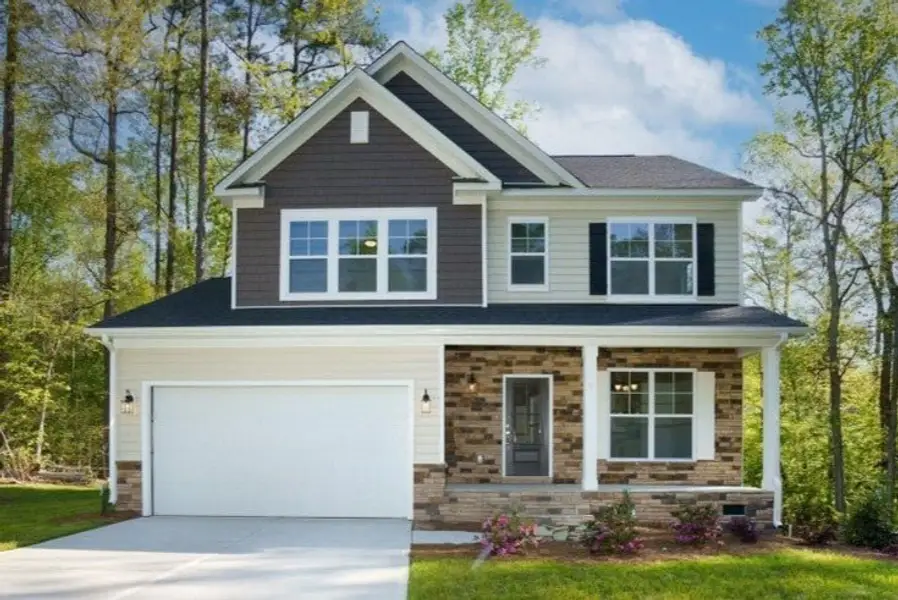 Representative exterior photo of a completed home built from the Badin by Caruso Homes in Blue Run, Raleigh, NC (Image 2). Representative exterior photo of a completed home built from the Badin by Caruso Homes in Blue Run, Raleigh, NC (Image 2).