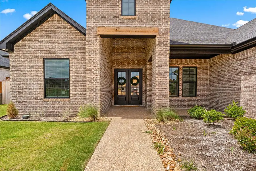 Exterior details and patio area of a home in , Woodway (Image 3).