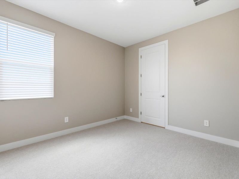 Spacious, unfurnished interior of a new home in Blossom Rock Signature Series, Apache Junction (Image 16).