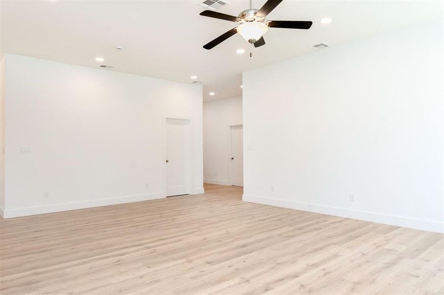 Living room, looking back to hallway with bedrooms