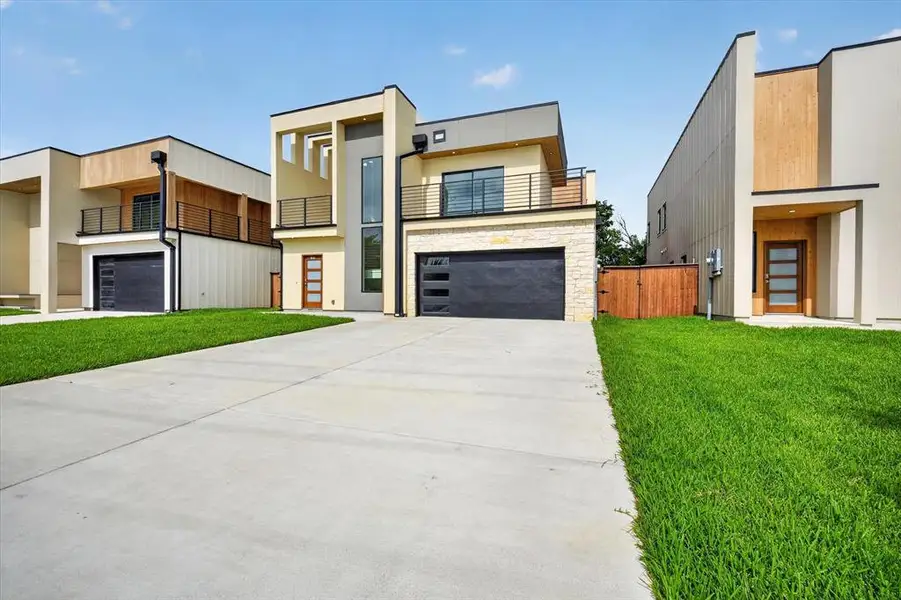 Front exterior of a new home in , Irving, TX, highlighting curb appeal (Image 1). Front exterior of a new home in , Irving, TX, highlighting curb appeal (Image 1).