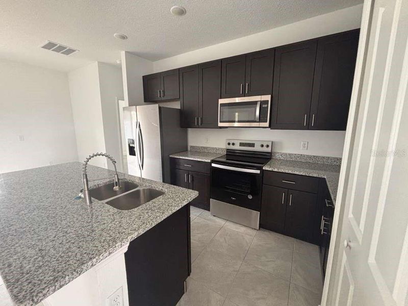 Furnished interior view inside a new home in , Citrus Springs (Image 6).
