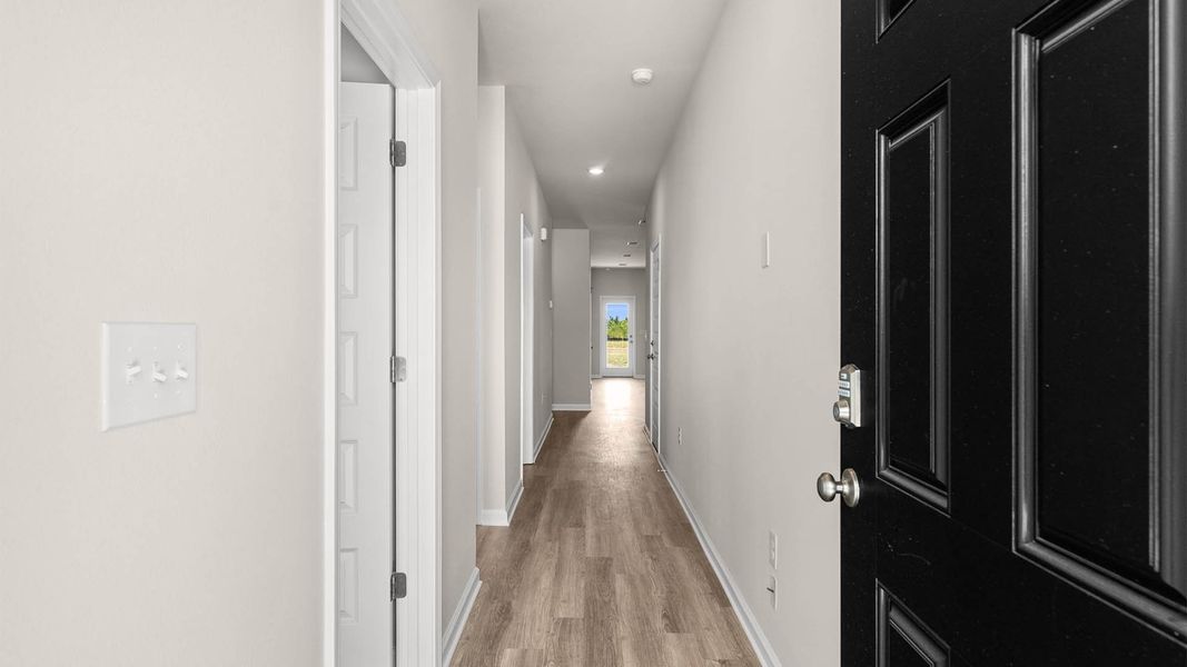 Representative unfurnished interior of a home built from the The Poppy by D.R. Horton in Liberty, Panama City (Image 12).