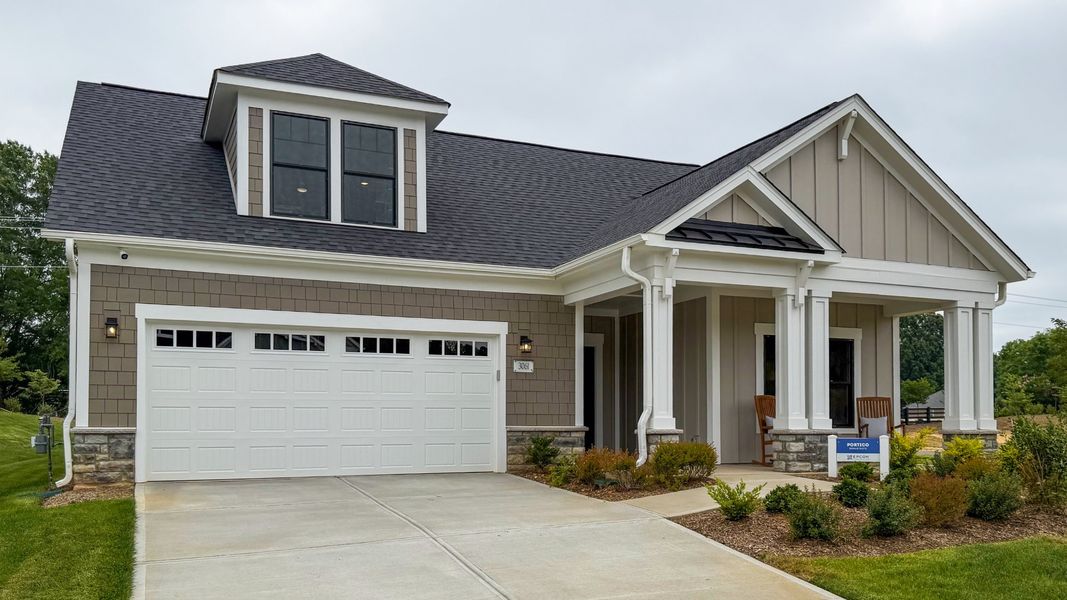 Representative exterior photo of a completed home built from the Portico by Epcon Communities in The Courtyards at Hodges Farm, Charlotte, NC (Image 28). Representative exterior photo of a completed home built from the Portico by Epcon Communities in The Courtyards at Hodges Farm, Charlotte, NC (Image 28).