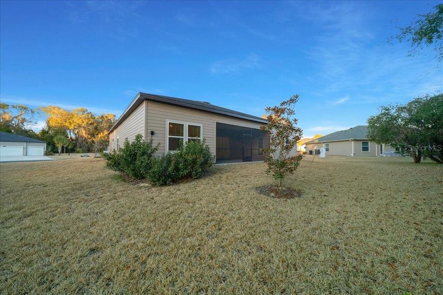 Exterior details and patio area of a home in Grand Park North, Dunnellon (Image 32).