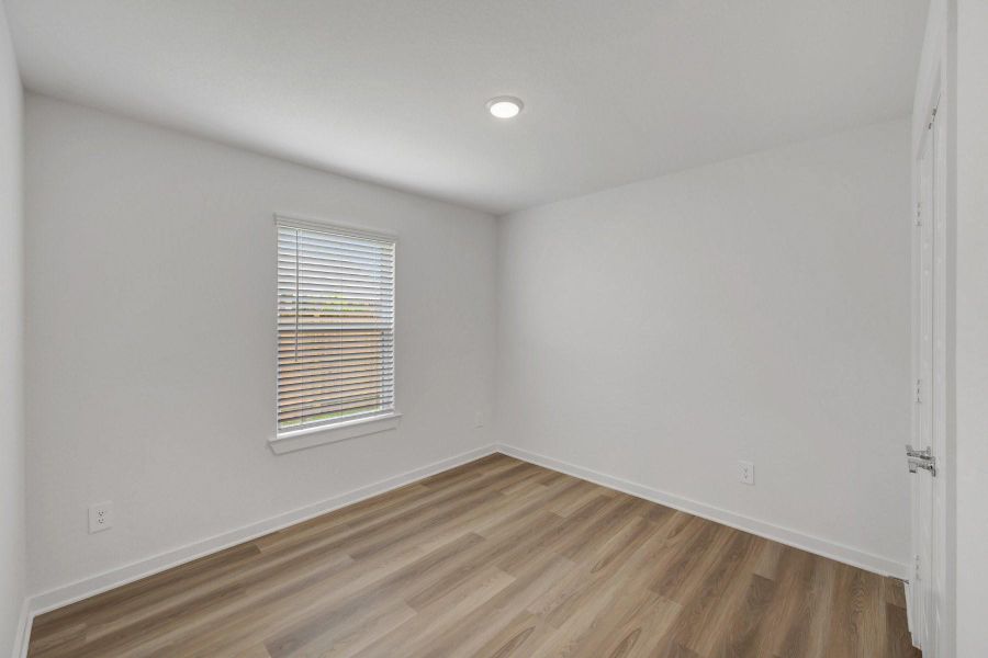 Spacious, unfurnished interior of a new home in Pinewood at Grand Texas, New Caney (Image 17).