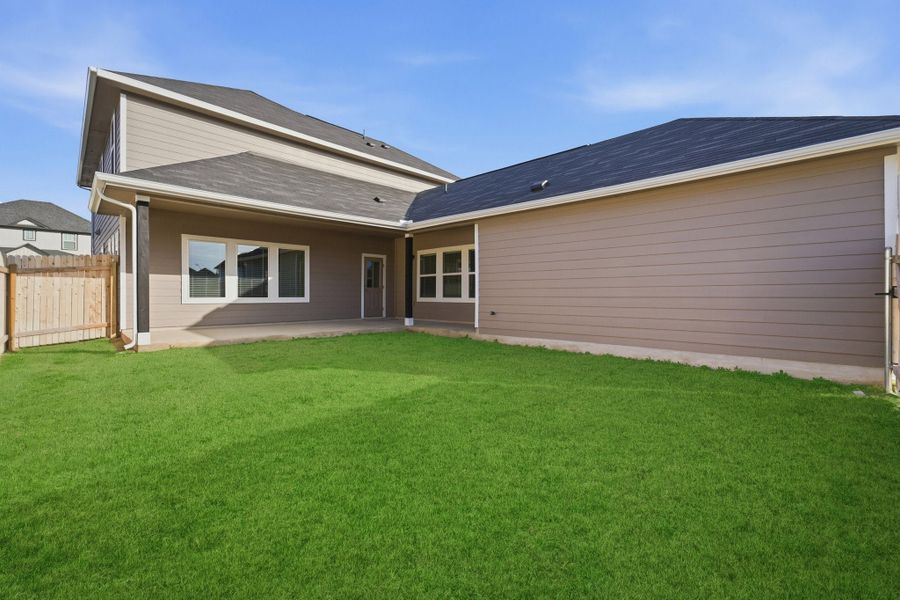 Exterior details and patio area of a home in Brooklands, Hutto (Image 4). Exterior details and patio area of a home in Brooklands, Hutto (Image 4).