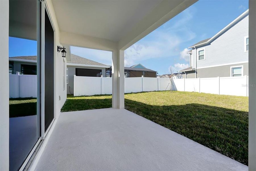 Exterior details and patio area of a home in Prairie Oaks, St. Cloud (Image 31).