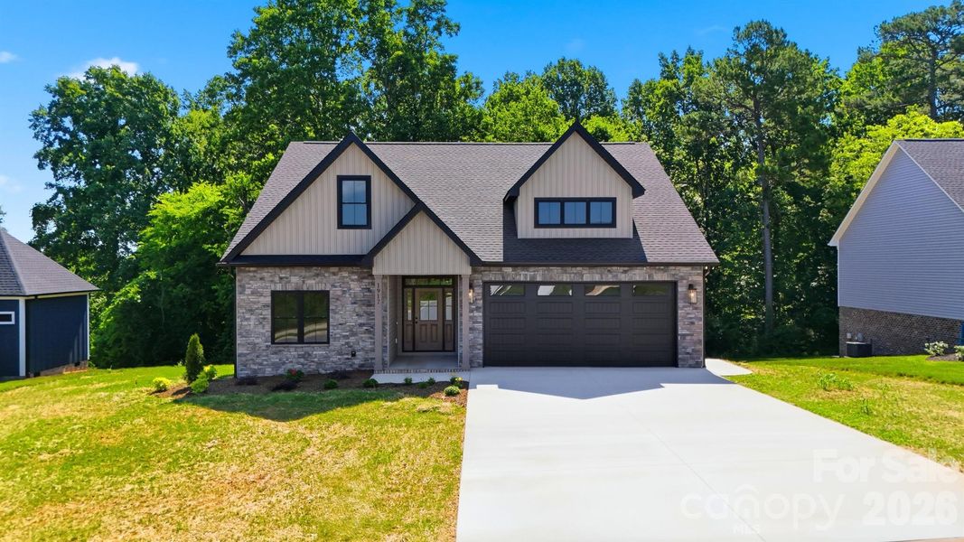 Front exterior of a new home in , Hickory, NC, highlighting curb appeal (Image 2). Front exterior of a new home in , Hickory, NC, highlighting curb appeal (Image 2).