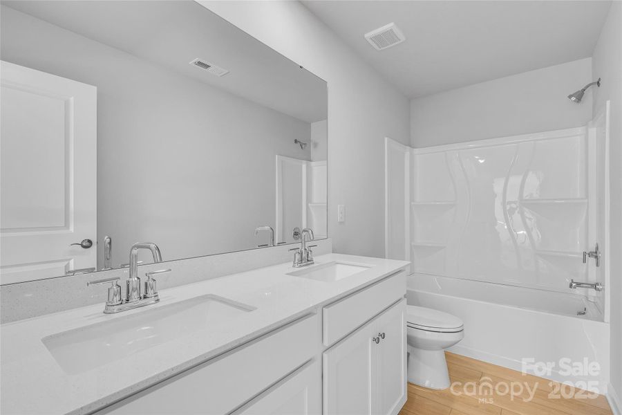 Furnished interior view inside a new home in Redhawk: Walk, Belmont (Image 7).