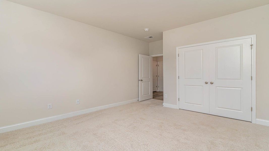 Representative unfurnished interior of a home built from the FORRESTER by D.R. Horton in Shell Pointe, Gilbert (Image 18).