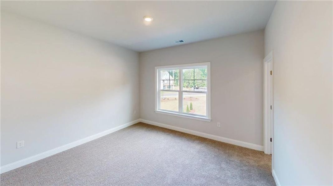 Spacious, unfurnished interior of a new home in Mirror Lake at South Harbour, Villa Rica (Image 18).