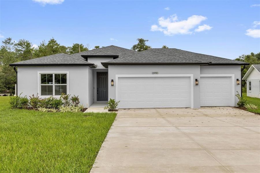 Front exterior of a new home in , Ocala, FL, highlighting curb appeal (Image 1). Front exterior of a new home in , Ocala, FL, highlighting curb appeal (Image 1).