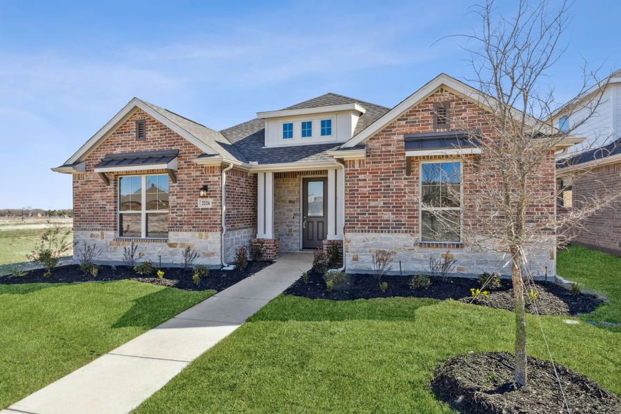 Front exterior of a new home in Dove Hollow, Waxahachie, TX, highlighting curb appeal (Image 21).