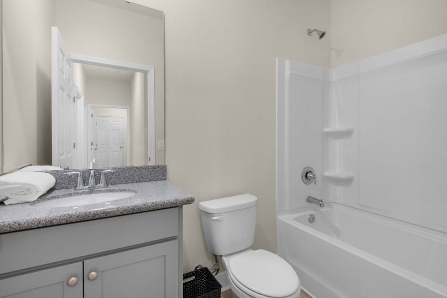Representative furnished interior of a home built from the Crystal by Holiday Builders in Yellow River Ranch, Milton (Image 11).