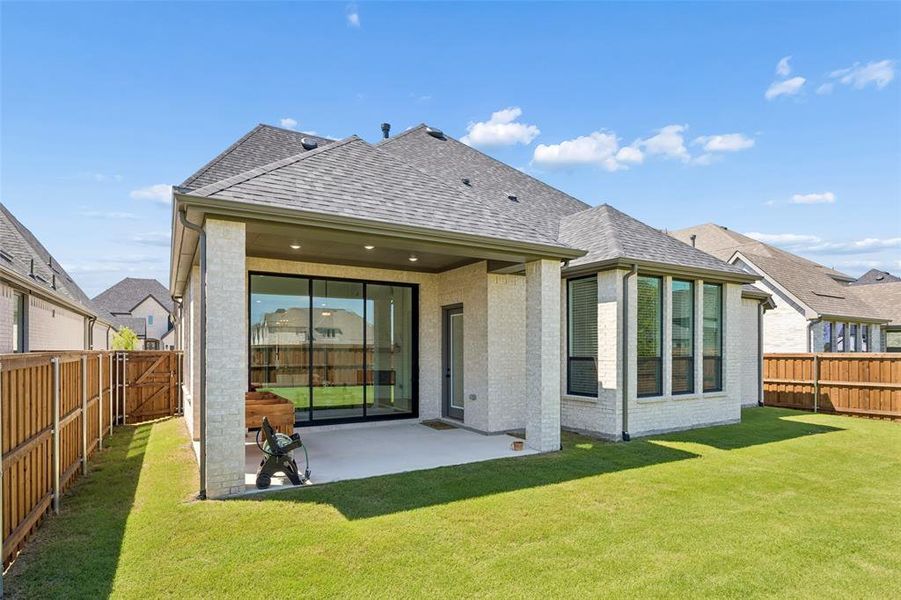 Exterior details and patio area of a home in Mosaic, Celina (Image 22).